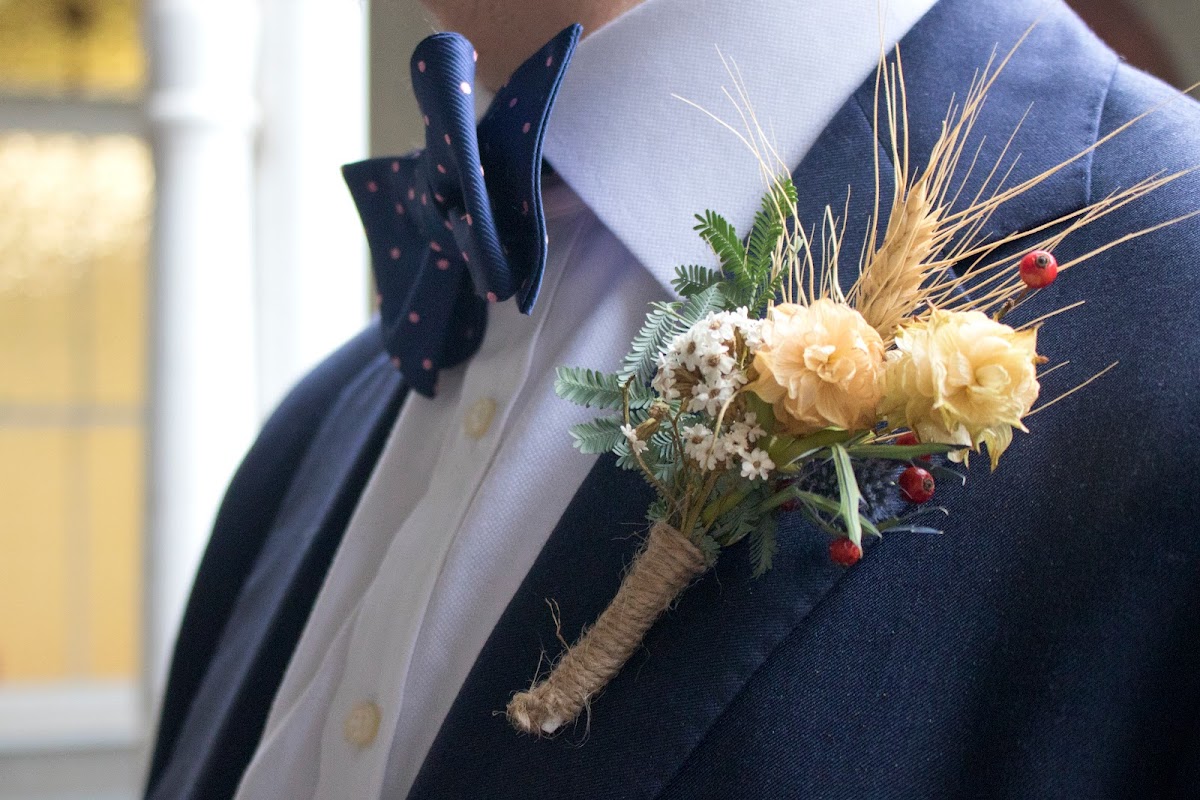 A bridal bouquet of native australian flowers and a beautiful bride